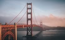 pexels-photo-1141853-1141853 Golden Gate Bridge shrouded in fog during sunset, San Francisco.